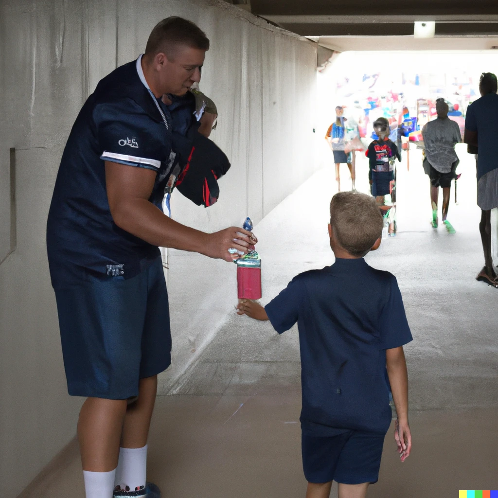 Prompt: A child gives a bottle of soda to a NFL player  in the tunnel to the stadium. 